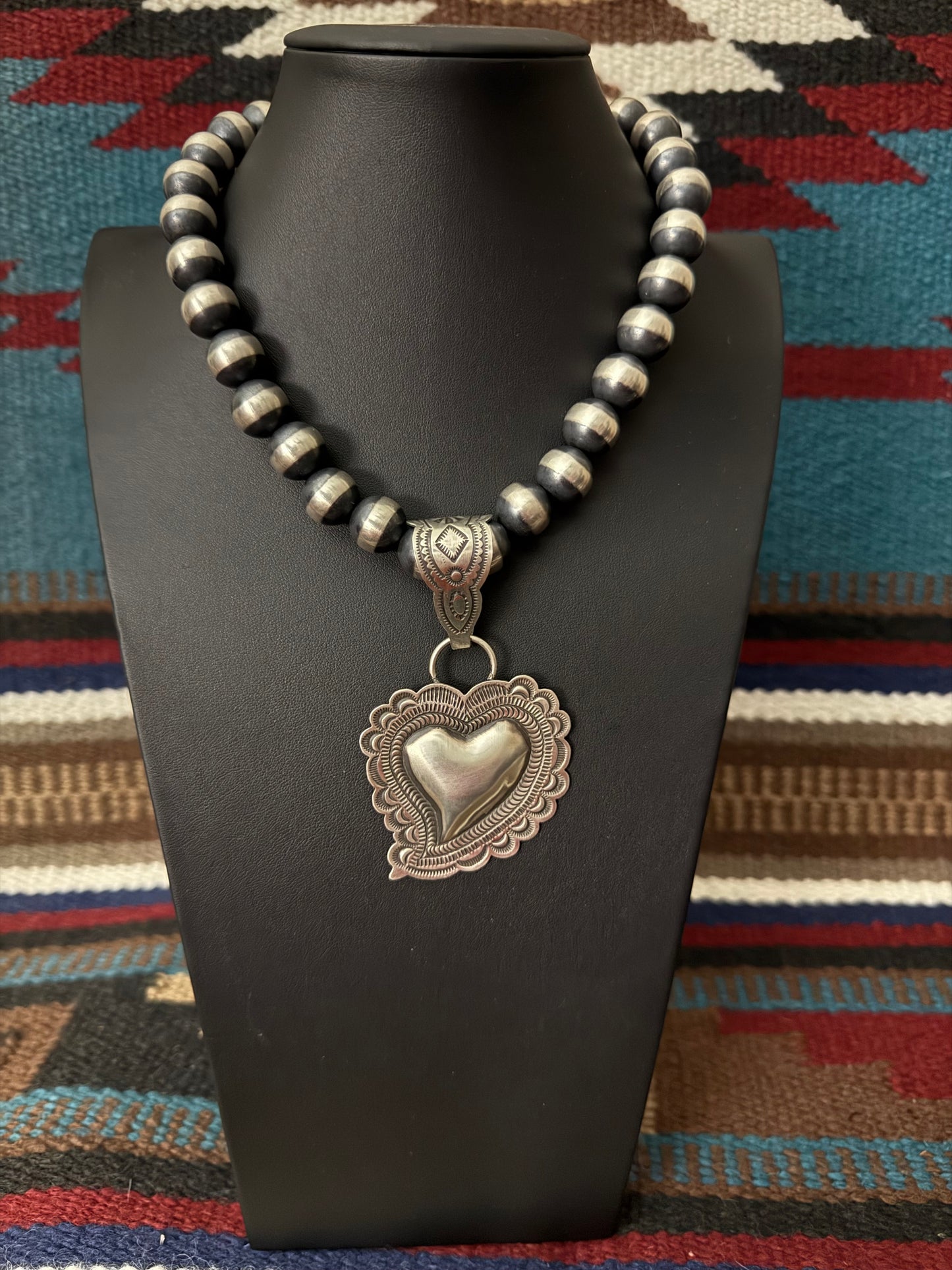 Sterling Silver Repousse Heart Pendant By Leander Tahe