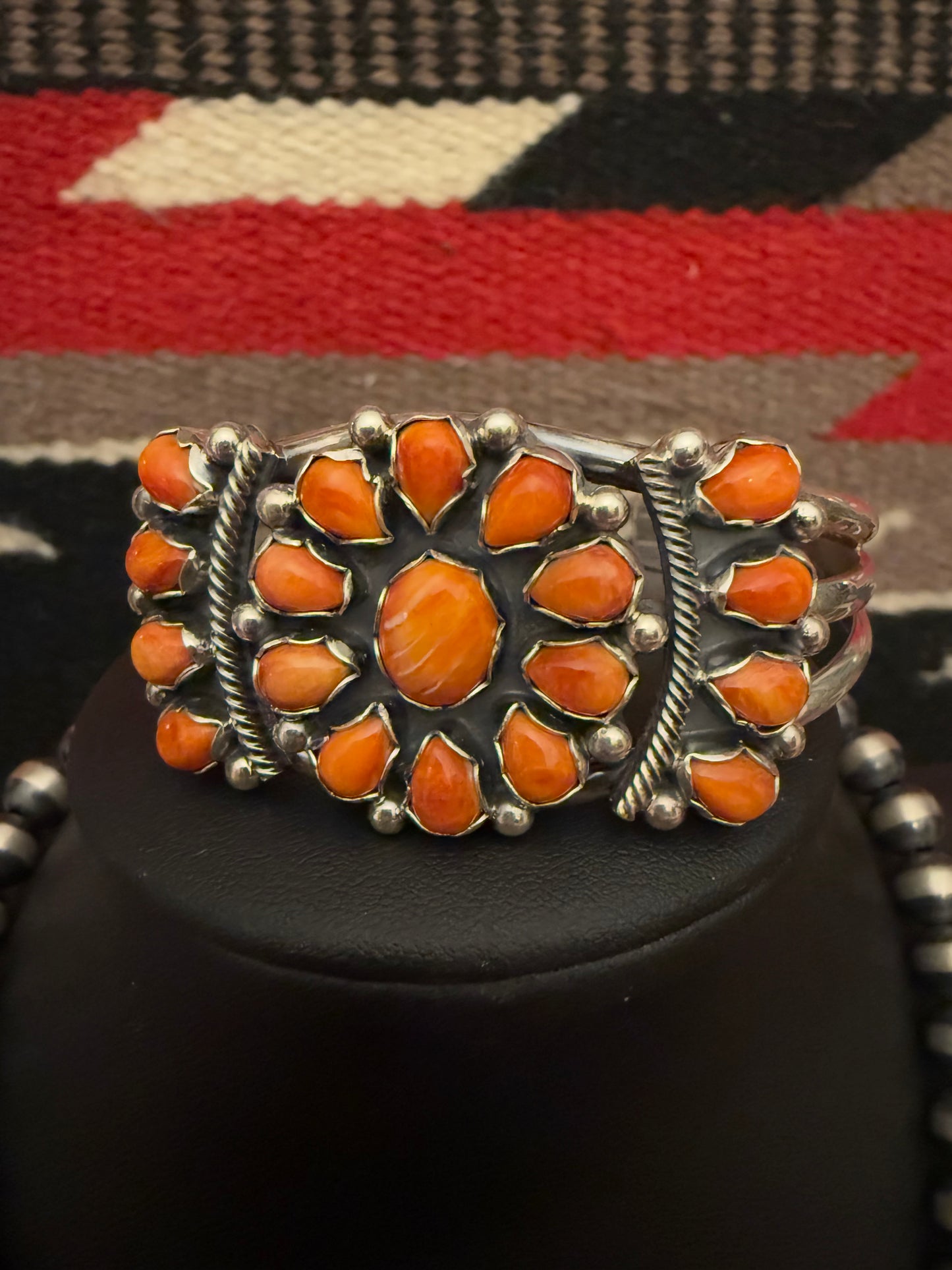 Sterling Silver Bracelet with a Cluster of Orange Spiny Stones