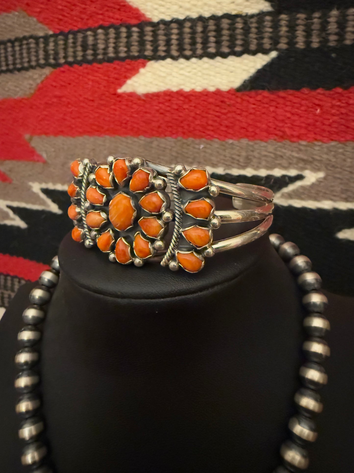 Sterling Silver Bracelet with a Cluster of Orange Spiny Stones
