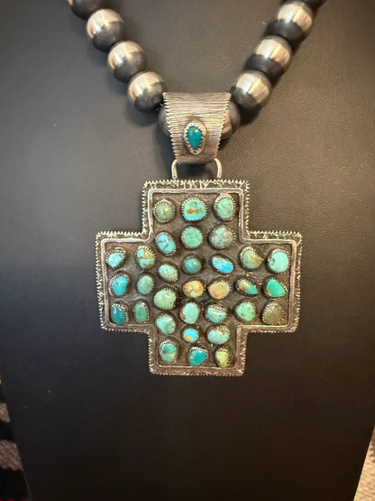 Sterling Silver and Turquoise Cross Pendant  By Delbert Arviso