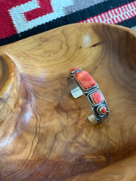 Sterling Silver Cuff with Orange Spiny Stones by Navajo Andy Cadman