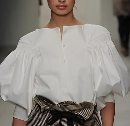 z   Puff Sleeves Buttoned Solid Color Blouse