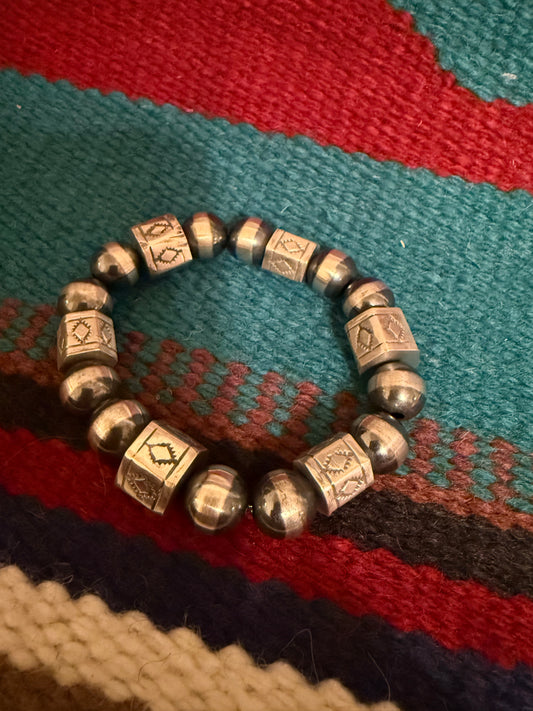 Sterling Silver Handmade Stretch Bracelet with Stamped Barrel Beads