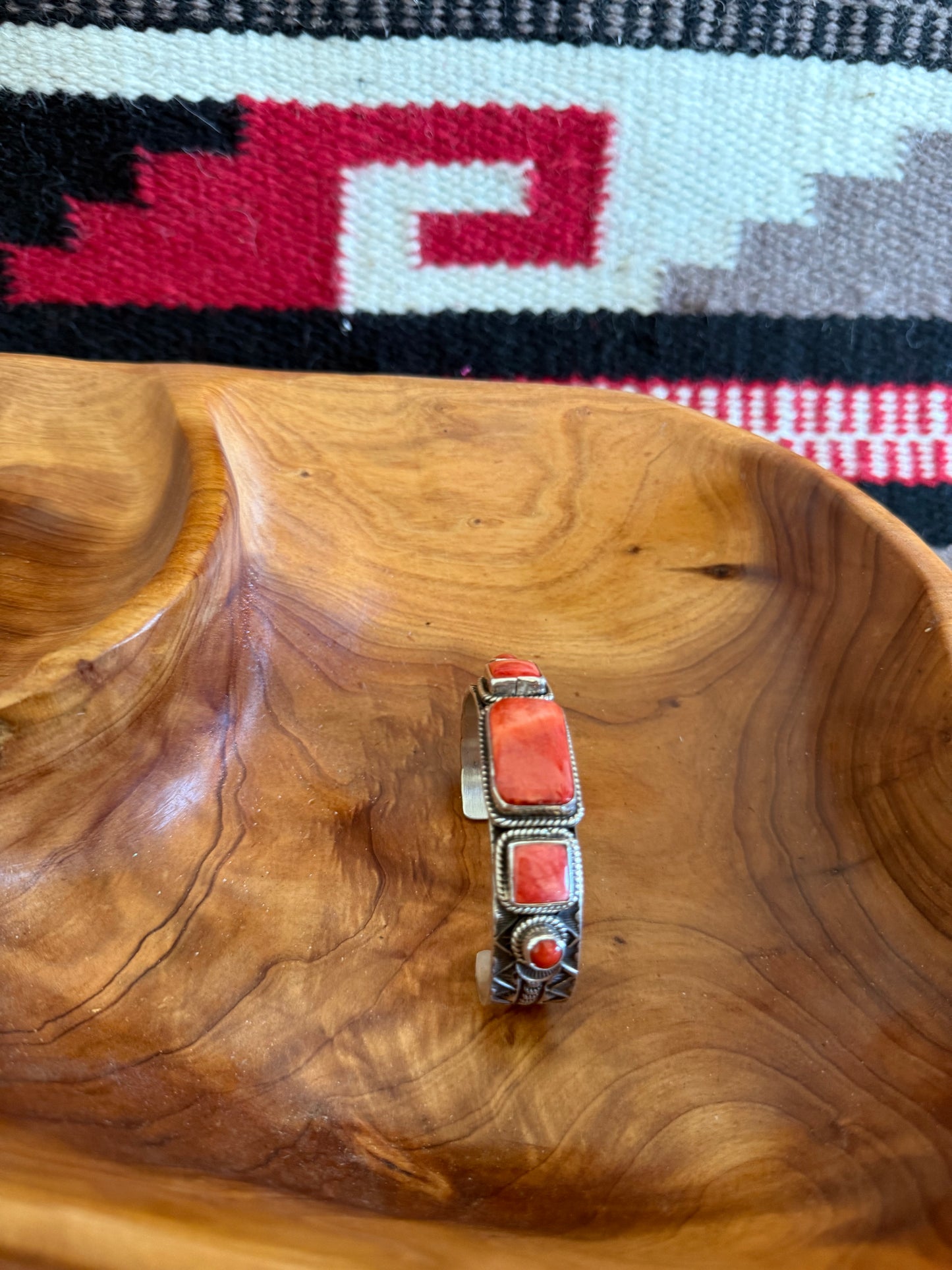 Sterling Silver Cuff with Orange Spiny Stones by Navajo Andy Cadman