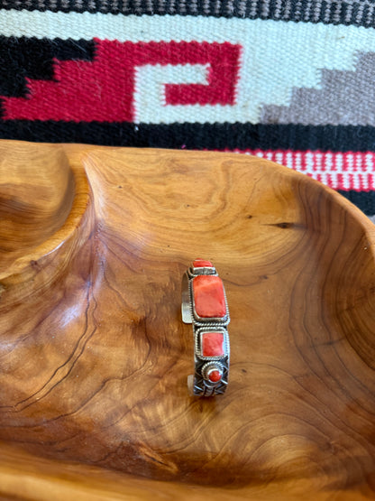 Sterling Silver Cuff with Orange Spiny Stones by Navajo Andy Cadman