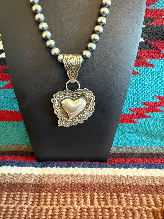 Sterlin Silver Heat Pendant
