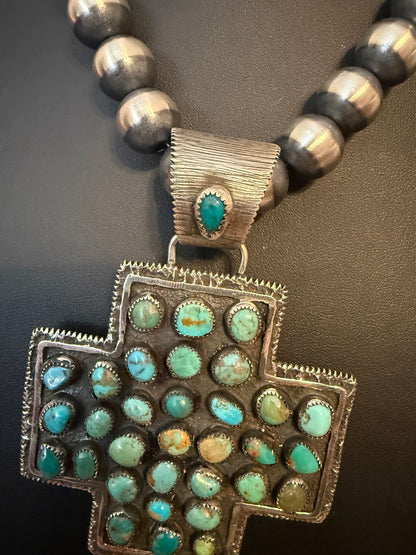 Sterling Silver and Turquoise Cross Pendant  By Delbert Arviso