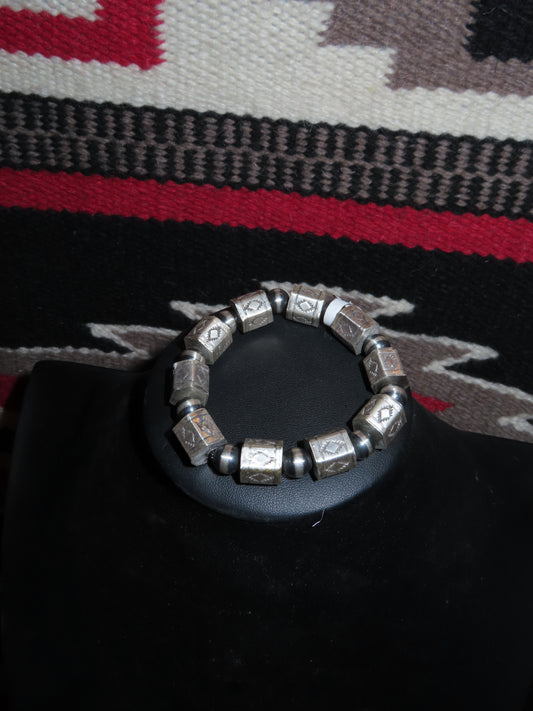 Sterling Silver Handmade Stretch Bracelet with Stamped Barrel Beads