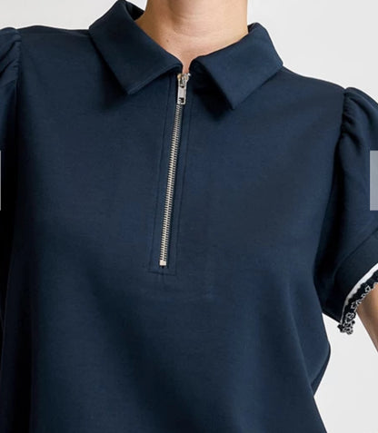 z   Zip-Up Ruffle Edge Polo Top