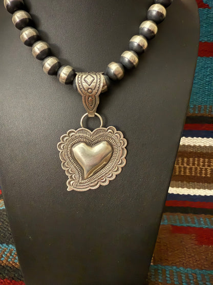 Sterling Silver Repousse Heart Pendant By Leander Tahe