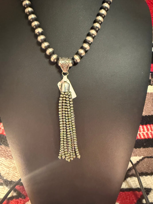 Sterling Silver Navajo Pearl Pendant With Stamped Bale