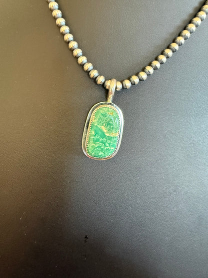 Sterling Silver Carico Lake Pendant By Rumardo Coriz