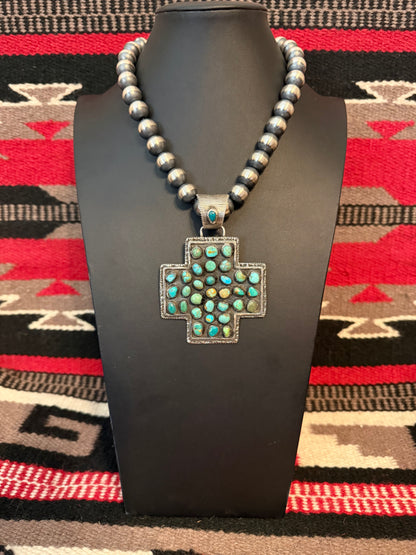 Sterling Silver and Turquoise Cross Pendant  By Delbert Arviso